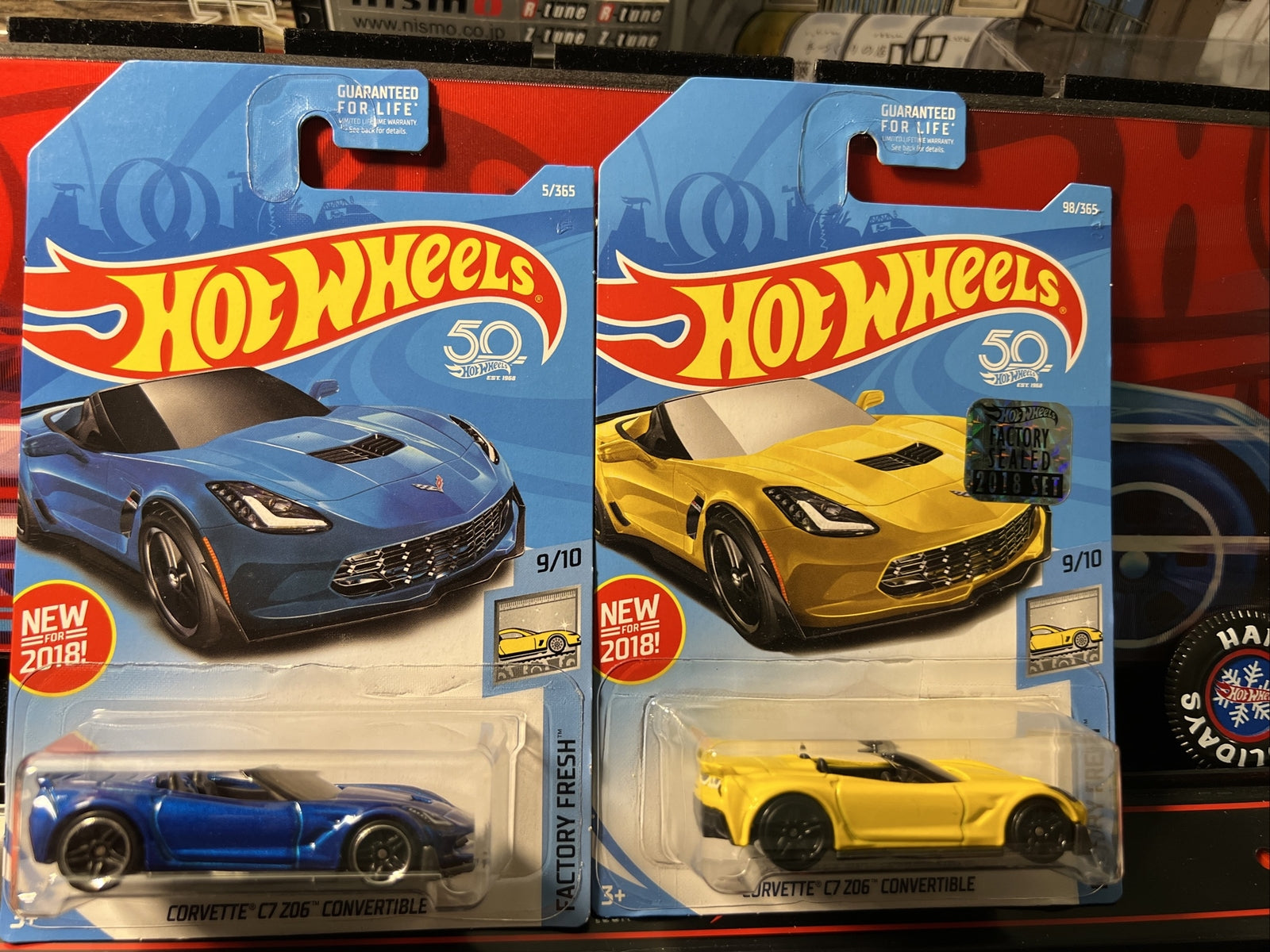 2ea Hot Wheels Corvette C7 Z06 Convertible Blue and Yellow1