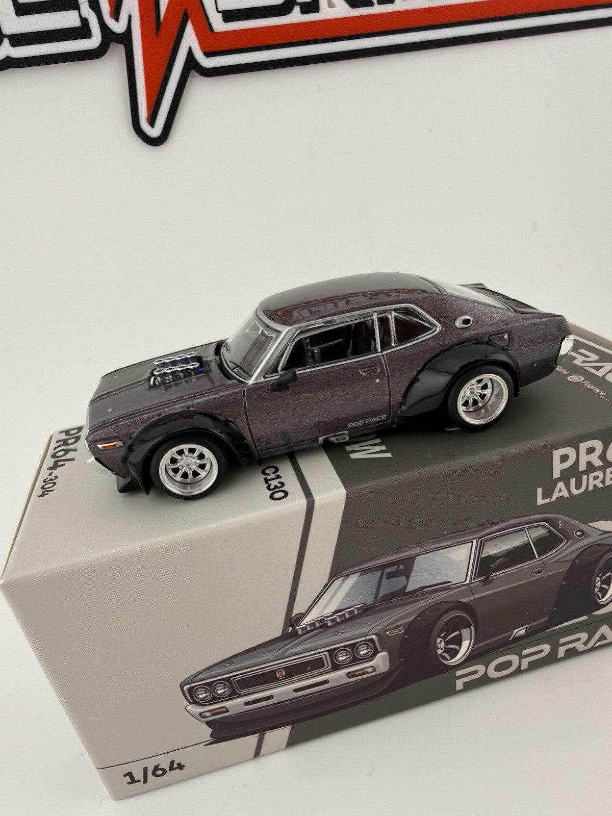 Nissan Laurel C130 Metallic Grey PopRace PR64-03042