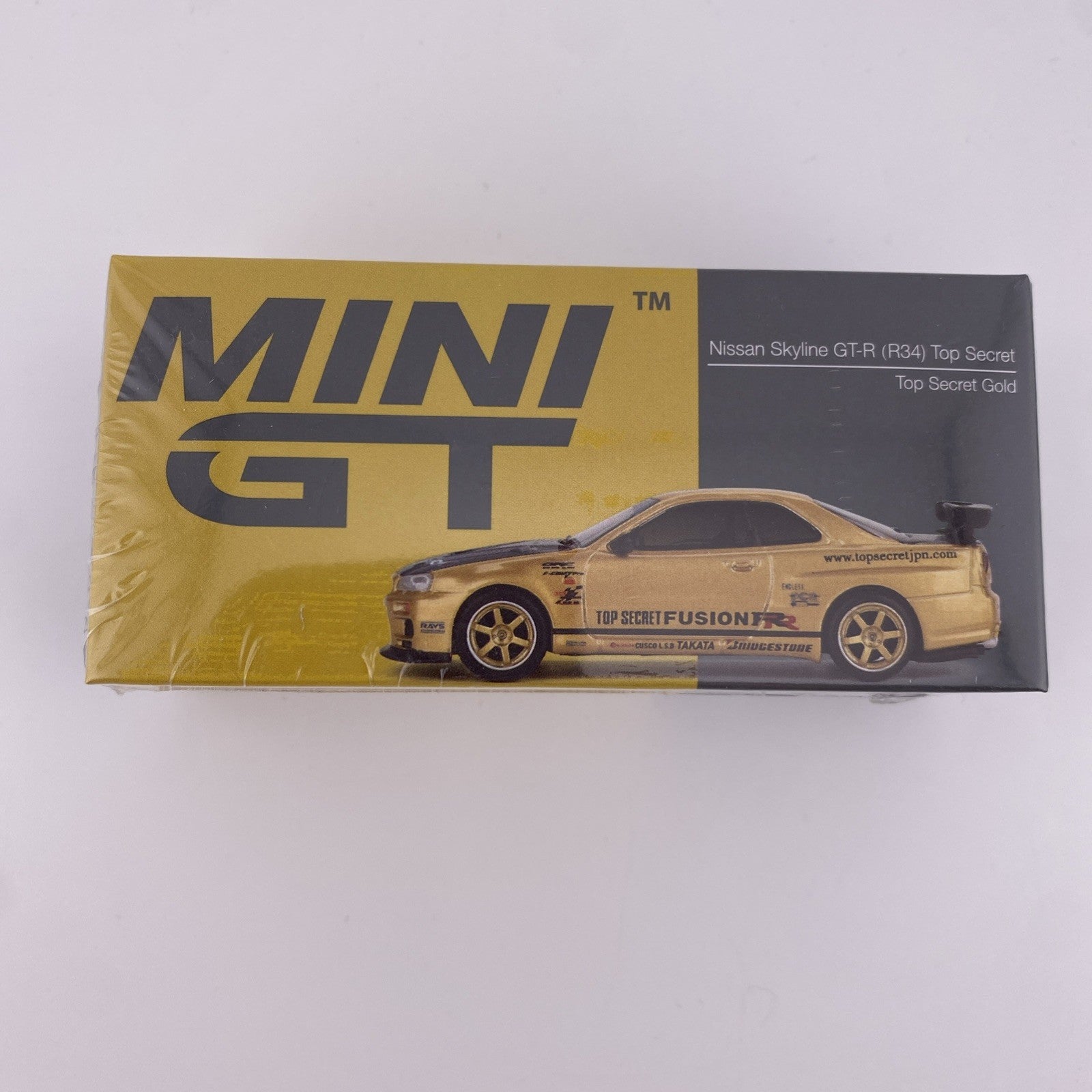 Nissan Skyline GT R (R34) Top Secret Gold Chrome   Mini GT MGT 00882 Sealed0