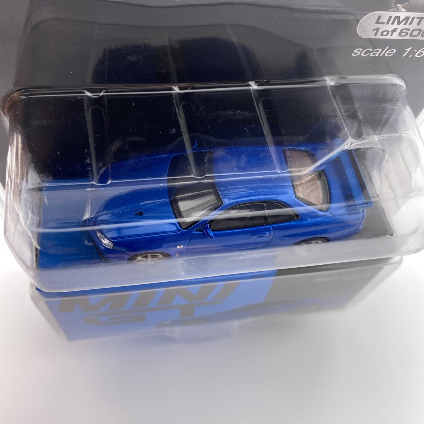 Nissan Skyline GT R R34 V Spec II   Bayside Blue   Mini GT 003413