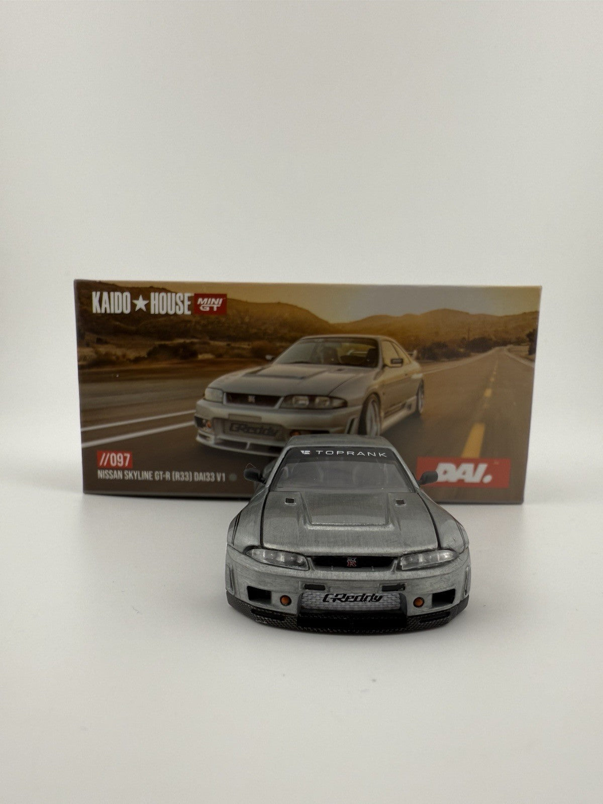 Chase   Kaido House x Mini GT 1:64 Nissan Skyline GT R (R33) DAI33 V1 KHMG0975