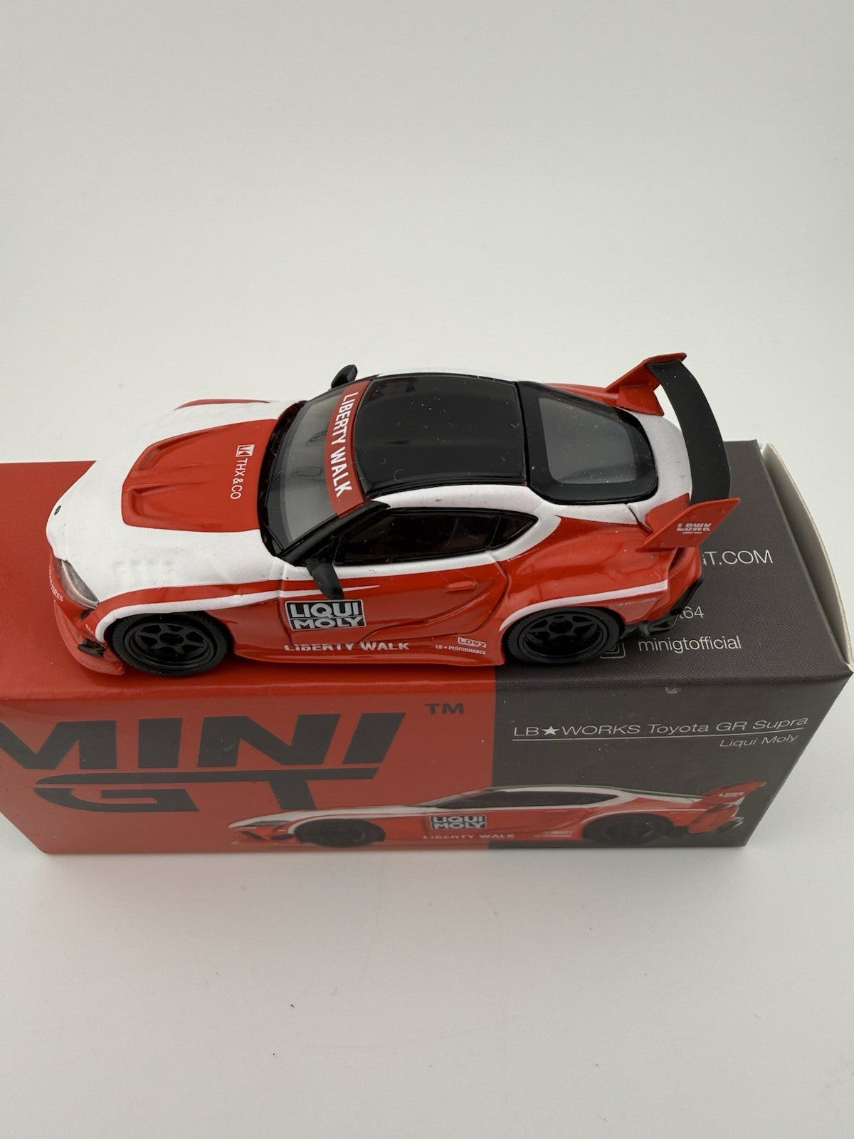 Toyota GR Supra LB Works Red   Mini GT MGT 00290 Liquid Moly1