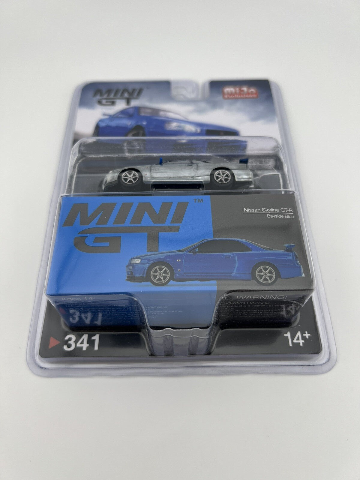 Chase   Nissan Skyline GT R (R34) V Spec II Bayside Blue   Mini GT MGT 003411