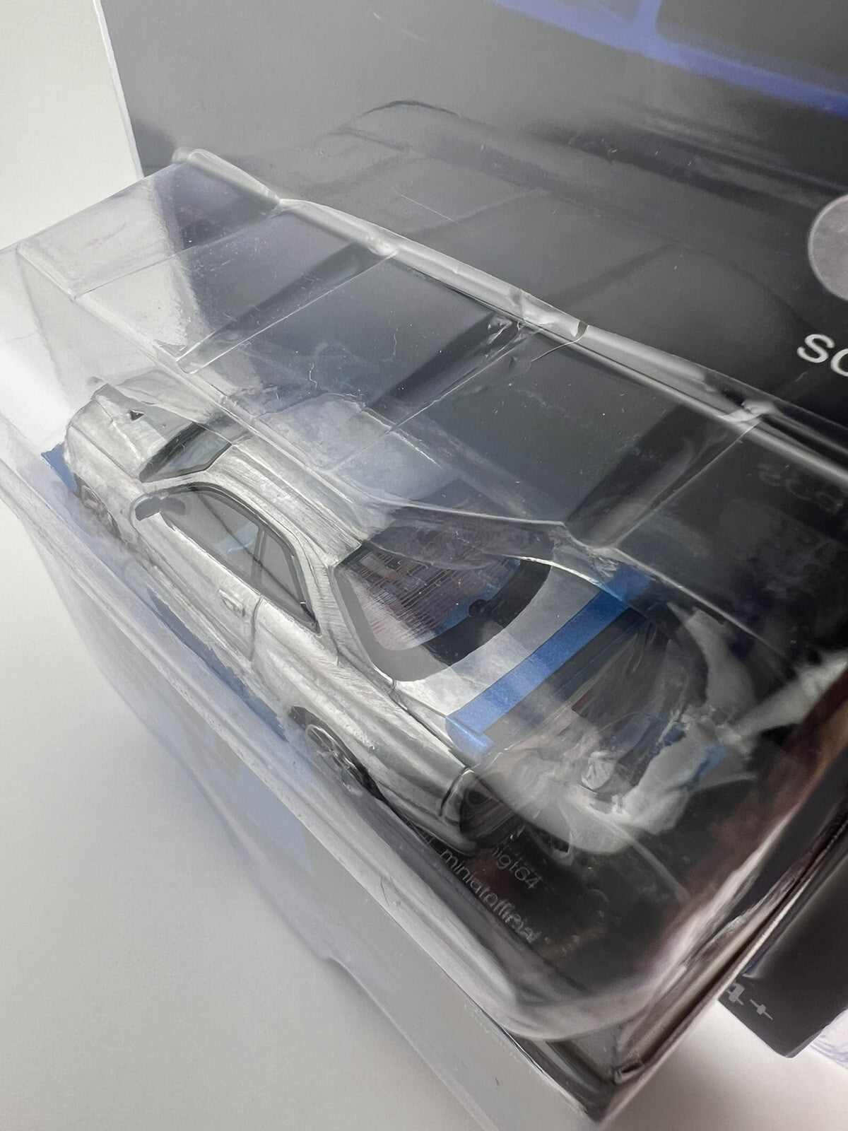 Chase   Nissan Skyline GT R (R34) V Spec II Bayside Blue   Mini GT MGT 003414