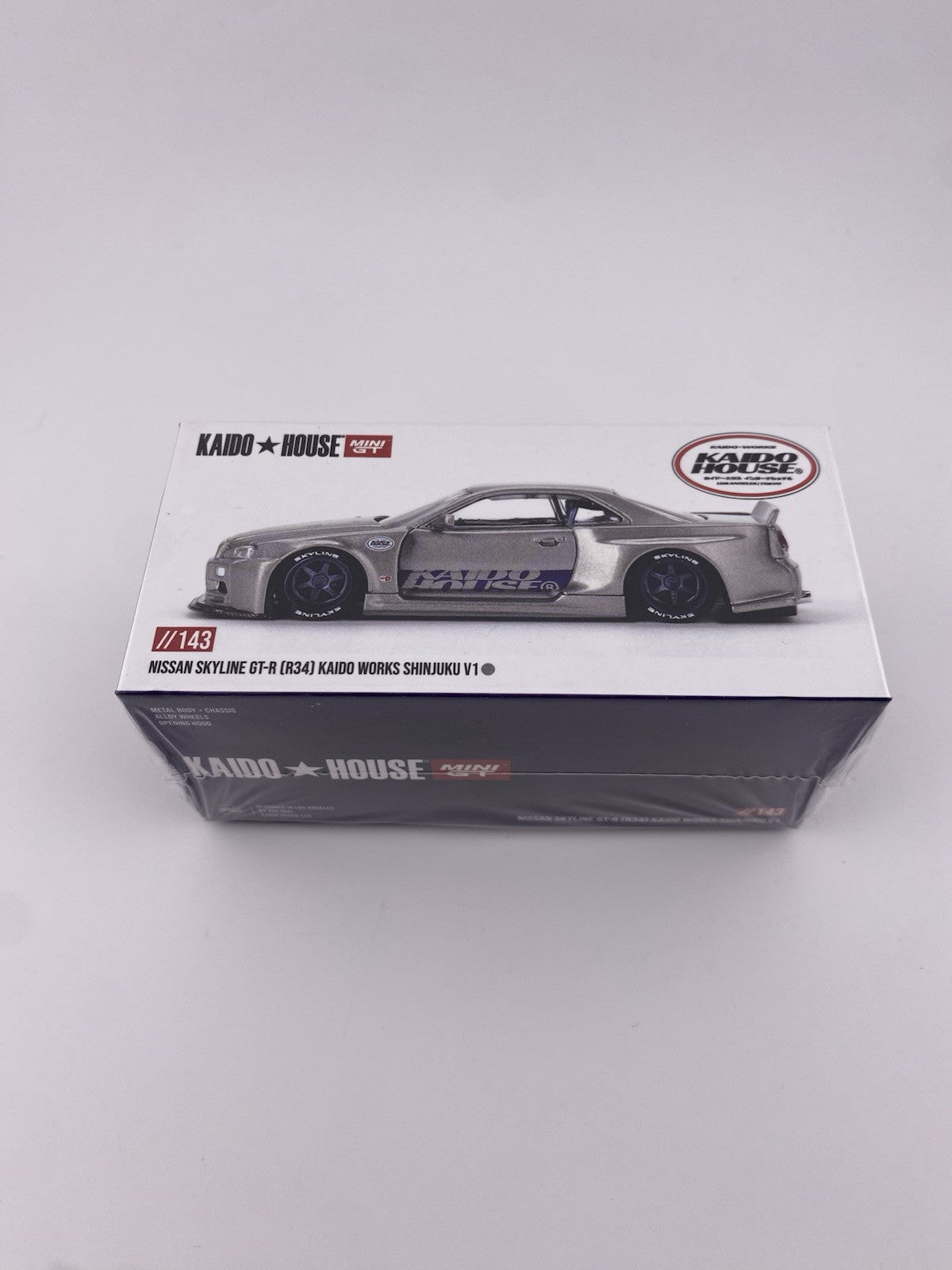 Chase   Nissan Skyline GT R (R34) Kaido House Shinjuku   Mini GT KHMG 1434