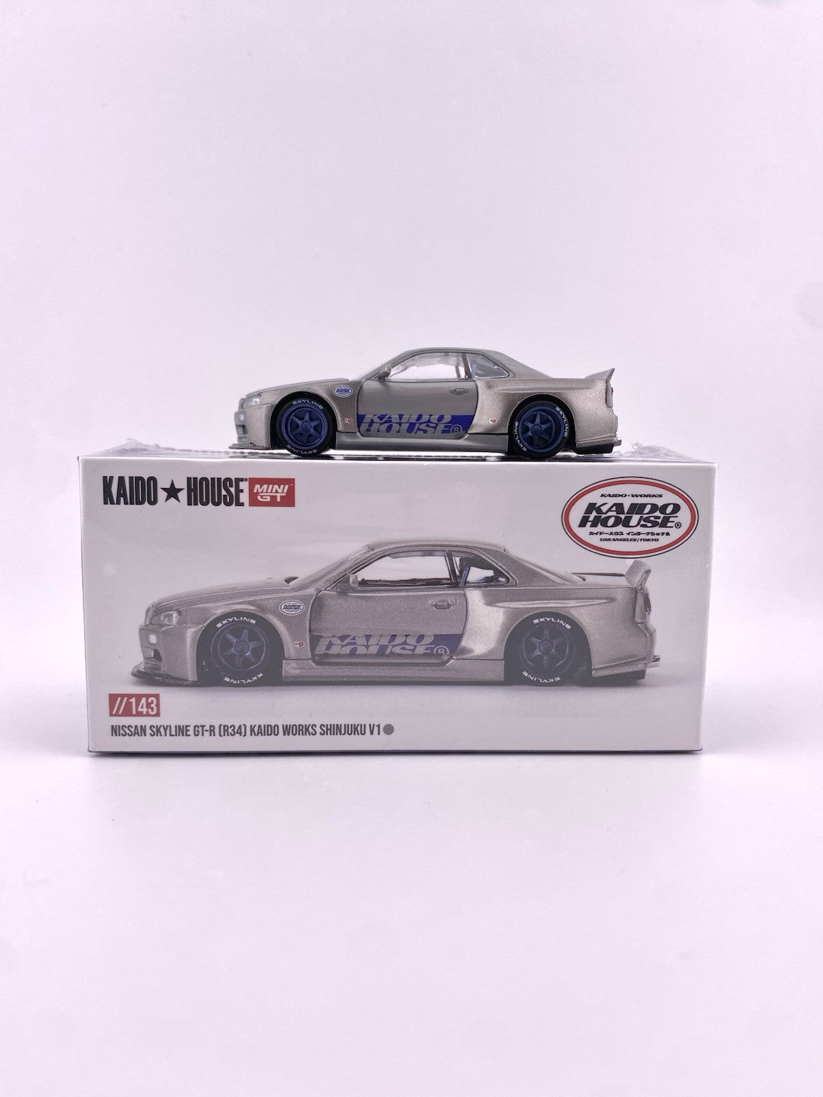 Chase   Nissan Skyline GT R (R34) Kaido House Shinjuku   Mini GT KHMG 1430